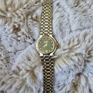 Vintage Gucci gold/silver/diamond watch